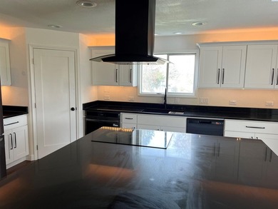 MLS# 291305 Beautiful remodeled 4 bedroom 2.5 bath setting on - photo 3