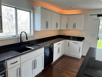 MLS# 291305 Beautiful remodeled 4 bedroom 2.5 bath setting on - photo 4
