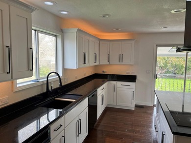 MLS# 291305 Beautiful remodeled 4 bedroom 2.5 bath setting on - photo 6