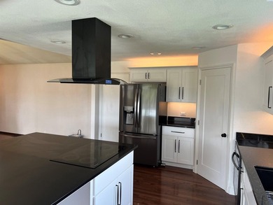 MLS# 291305 Beautiful remodeled 4 bedroom 2.5 bath setting on - photo 8