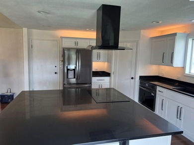MLS# 291305 Beautiful remodeled 4 bedroom 2.5 bath setting on - photo 9