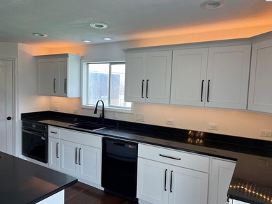 MLS# 291305 Beautiful remodeled 4 bedroom 2.5 bath setting on - photo 10