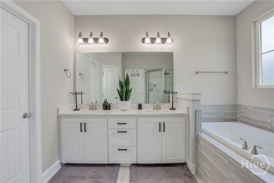 Located in the welcoming Woodland Trail Community with - photo 30