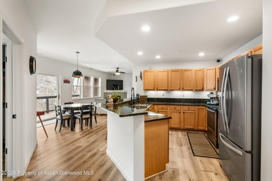 This bright, beautifully updated top-floor condo offers - photo 2