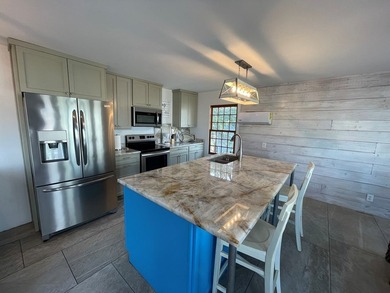 Waterfront 3/3 on Key Allegro featuring a large dock, boat lift - photo 11