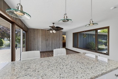 This three-bedroom, two-bath, 2,248-square-foot year-round home - photo 13