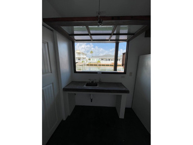 Waterfront 3/3 on Key Allegro featuring a large dock, boat lift - photo 24