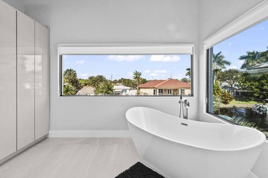 Immerse yourself in modern luxury in this stunning waterfront - photo 26