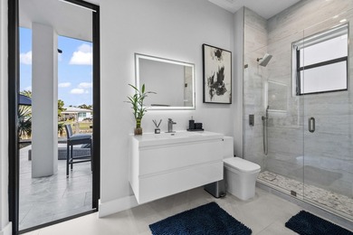 Immerse yourself in modern luxury in this stunning waterfront - photo 37