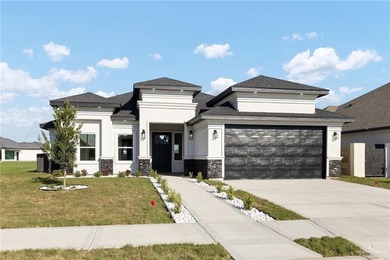 Stunning new construction home located on the golf course in a - photo 1
