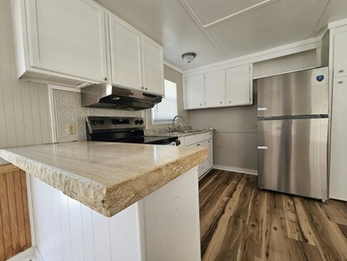 Twin Pines Village, a professionally managed, well-maintained - photo 4