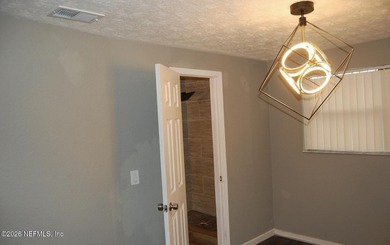 Step into this cozy 3-bedroom, 3-bathroom home nestled in a - photo 14