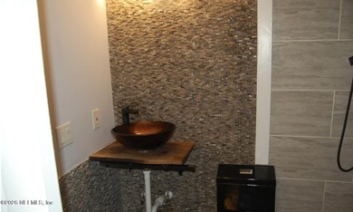 Step into this cozy 3-bedroom, 3-bathroom home nestled in a - photo 18