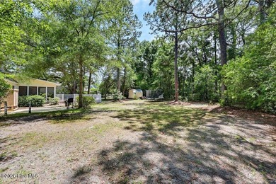 Charming 3-bedroom, 2-bath home ideally situated on a corner lot - photo 32