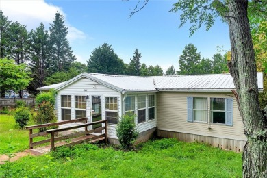 This Doublewide Mobile Home with 2068 Sq. Ft., 3 bedrooms/2 full