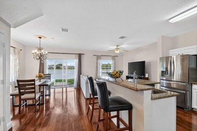 Welcome to this WATERFRONT END UNIT TOWNHOME in Emerald Lakes of - photo 12