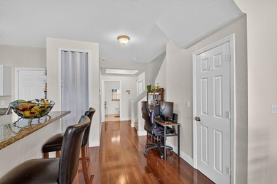 Welcome to this WATERFRONT END UNIT TOWNHOME in Emerald Lakes of - photo 13