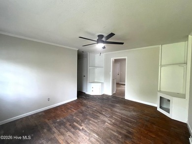 This charming three-bedroom ranch offers incredible potential - photo 4