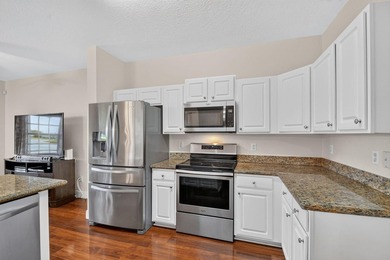 Welcome to this WATERFRONT END UNIT TOWNHOME in Emerald Lakes of - photo 15