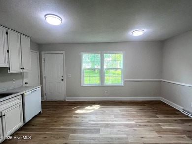 This charming three-bedroom ranch offers incredible potential - photo 8