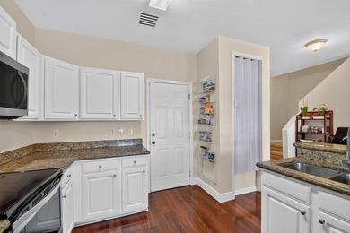 Welcome to this WATERFRONT END UNIT TOWNHOME in Emerald Lakes of - photo 18