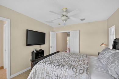 Welcome to this WATERFRONT END UNIT TOWNHOME in Emerald Lakes of - photo 30