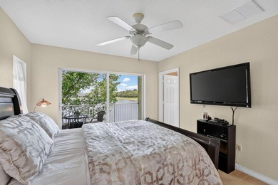 Welcome to this WATERFRONT END UNIT TOWNHOME in Emerald Lakes of - photo 31