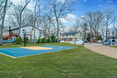 This beautifully maintained 6-bedroom, 6-bath Hi-Ranch, built in - photo 34