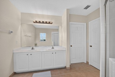 Welcome to this WATERFRONT END UNIT TOWNHOME in Emerald Lakes of - photo 35
