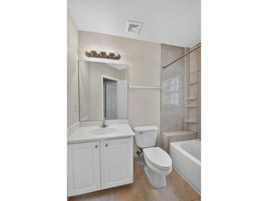 Welcome to this WATERFRONT END UNIT TOWNHOME in Emerald Lakes of - photo 48