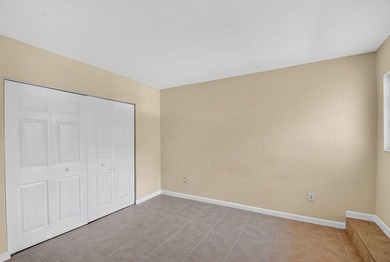 Welcome to this WATERFRONT END UNIT TOWNHOME in Emerald Lakes of - photo 50