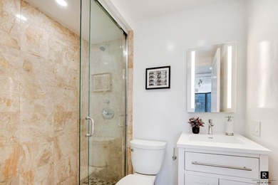 Renovated 3-Bedroom, 3-Bathroom Corner Condo with Washer/Dryer - photo 12