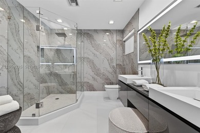 Nestled within the prestigious gated community of Gables by the - photo 15