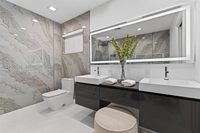 Nestled within the prestigious gated community of Gables by the - photo 16