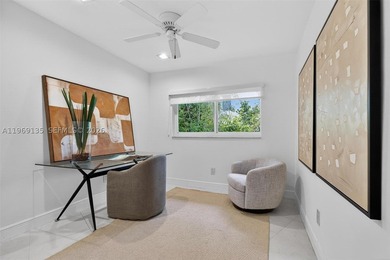 Nestled within the prestigious gated community of Gables by the - photo 17