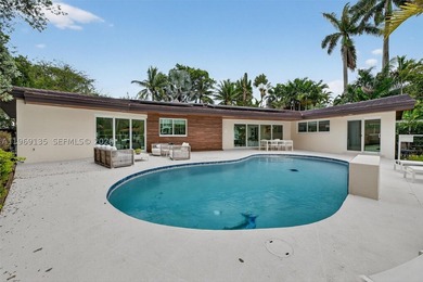 Nestled within the prestigious gated community of Gables by the - photo 19