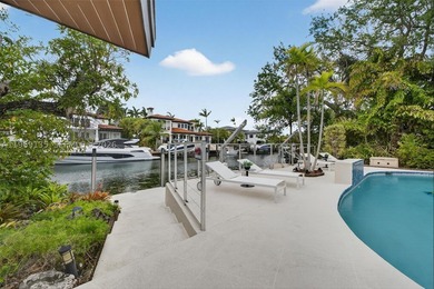 Nestled within the prestigious gated community of Gables by the - photo 20