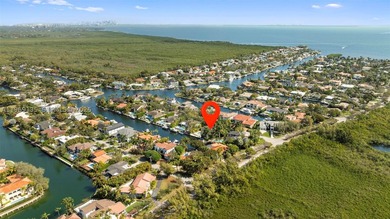 Nestled within the prestigious gated community of Gables by the - photo 25