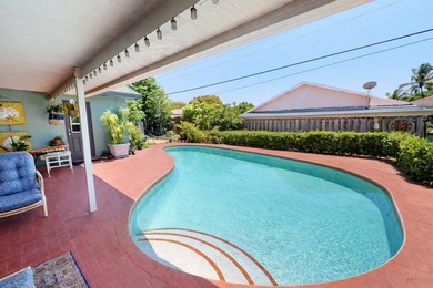 Welcome to this beautifully refreshed pool home located in the - photo 2