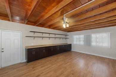Welcome to this beautifully refreshed pool home located in the - photo 3