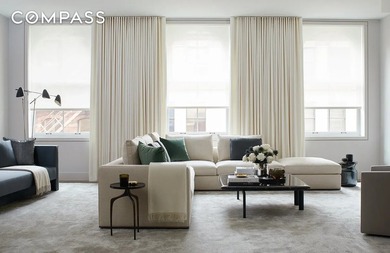 Spanning 4,500 square feet, this duplex penthouse with a private - photo 1