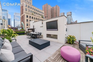 Spanning 4,500 square feet, this duplex penthouse with a private - photo 2
