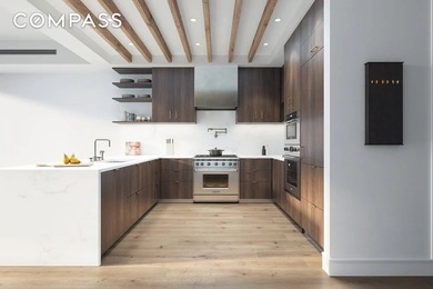 Spanning 4,500 square feet, this duplex penthouse with a private - photo 4