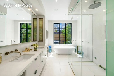 Spanning 4,500 square feet, this duplex penthouse with a private - photo 7