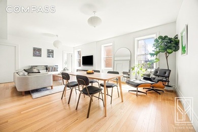 Loft-like, luminous, and tranquil, this fully-renovated pre-war - photo 1