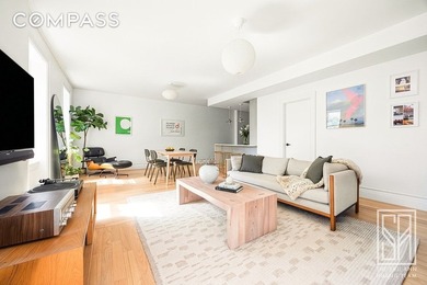 Loft-like, luminous, and tranquil, this fully-renovated pre-war - photo 2
