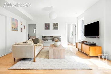 Loft-like, luminous, and tranquil, this fully-renovated pre-war - photo 3