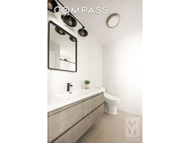 Loft-like, luminous, and tranquil, this fully-renovated pre-war - photo 8
