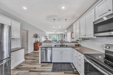 Turn-key and beautifully remodeled, this entry-level end-unit - photo 28