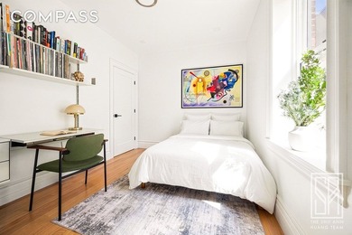 Loft-like, luminous, and tranquil, this fully-renovated pre-war - photo 9